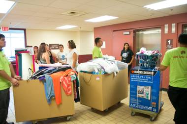 Students move into the dorms at UNLV during campus move-in day, Thursday Aug. 22, 2013.